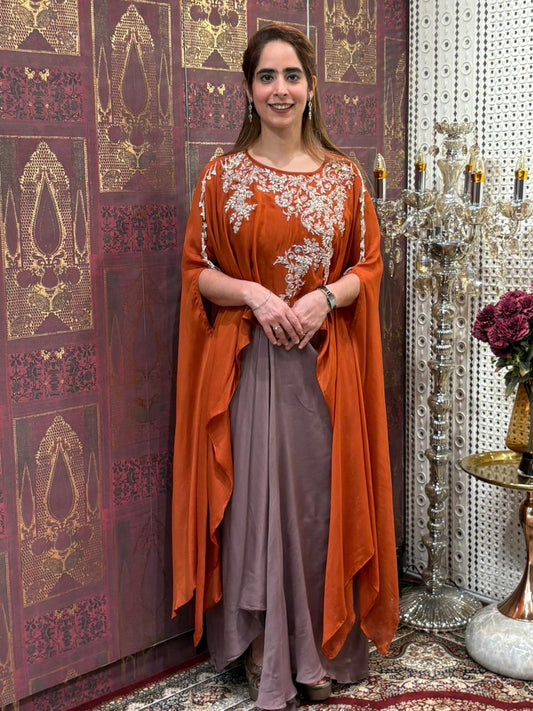 Elegant crop top with dhoti skirt and flowing cape