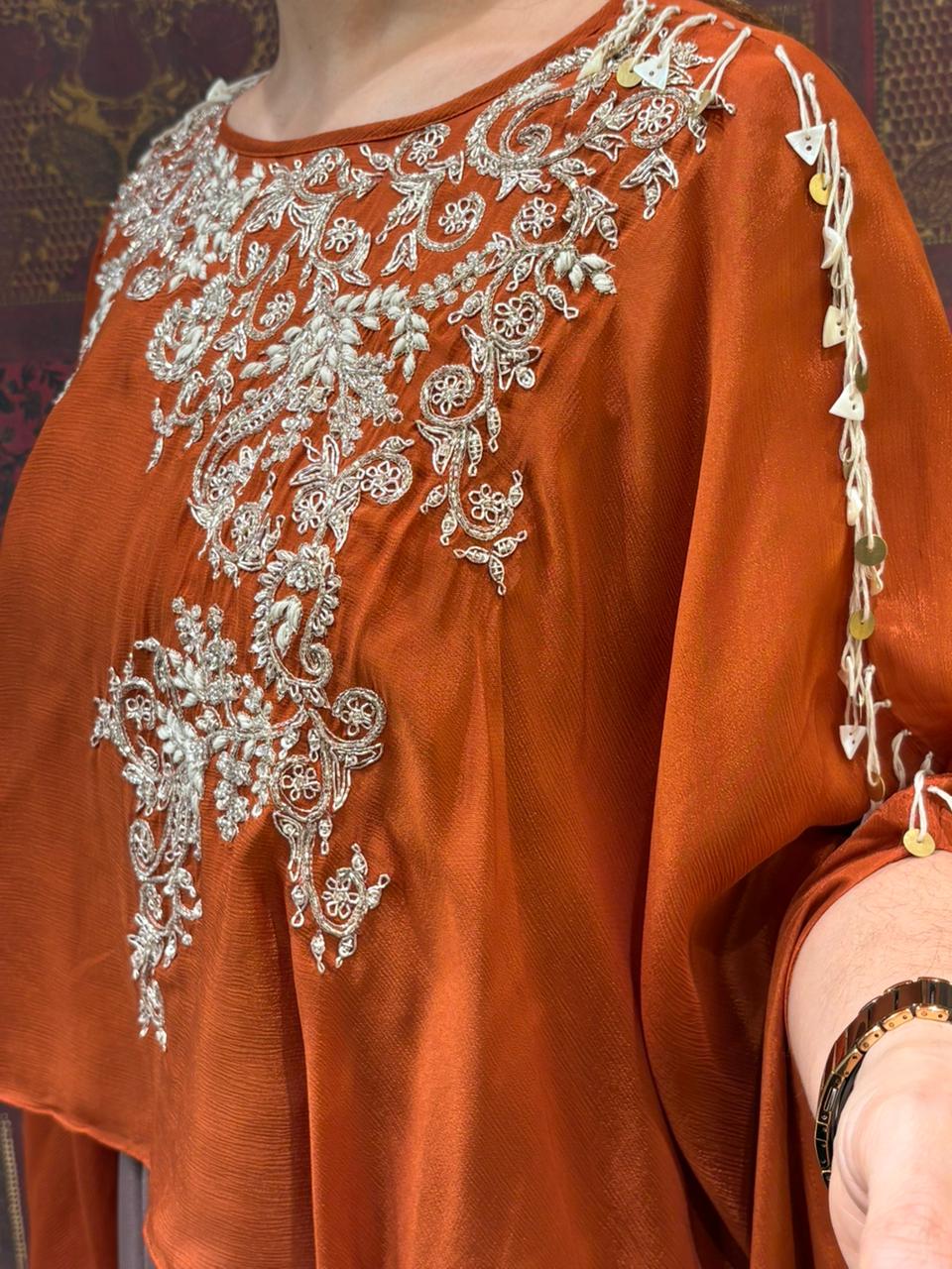 Elegant crop top with dhoti skirt and flowing cape