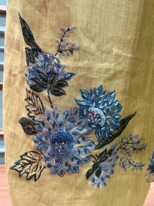 Olive green unstitched suit fabric with delicate blue floral embroidery