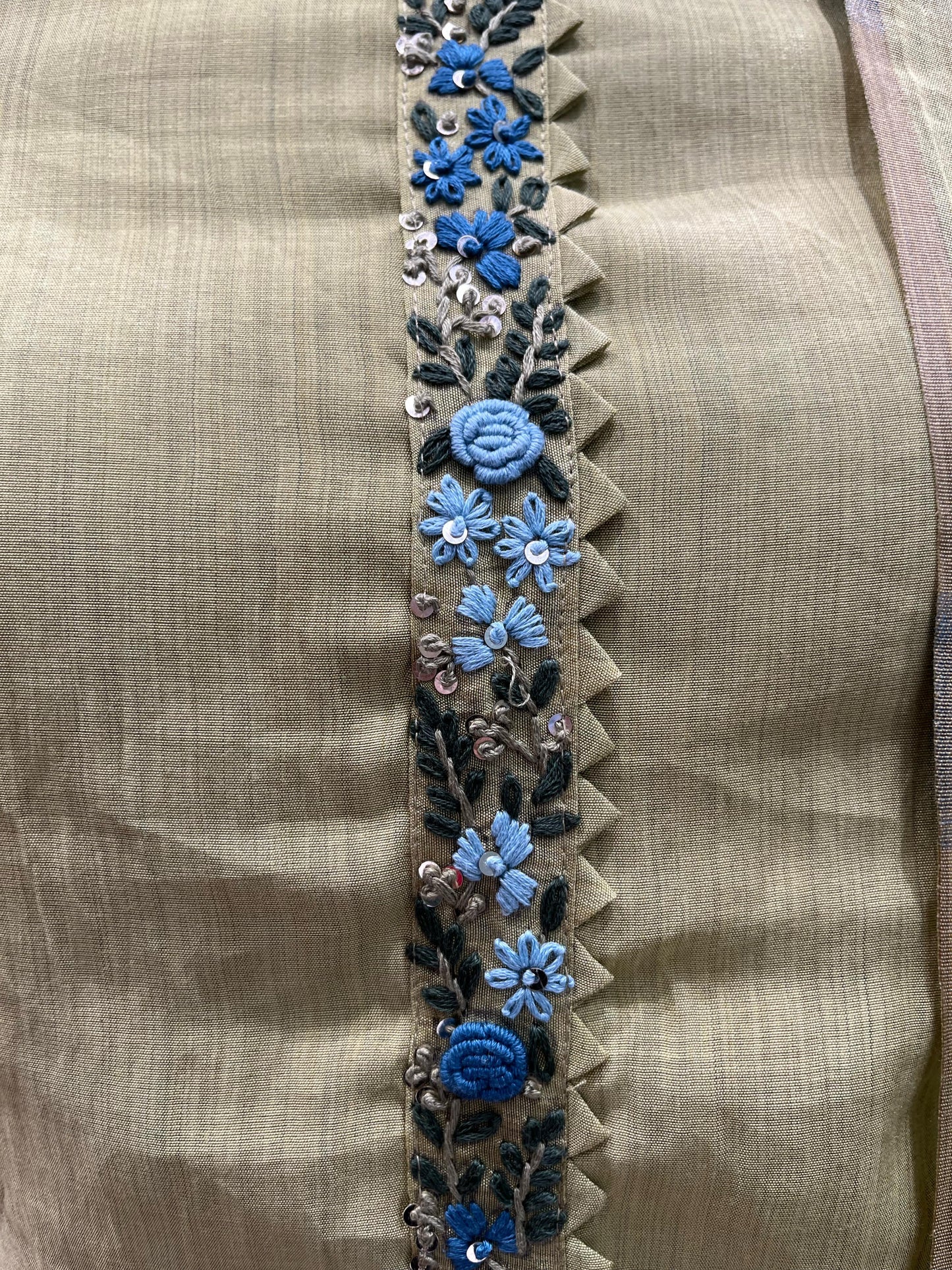 Olive green unstitched suit fabric with delicate blue floral embroidery