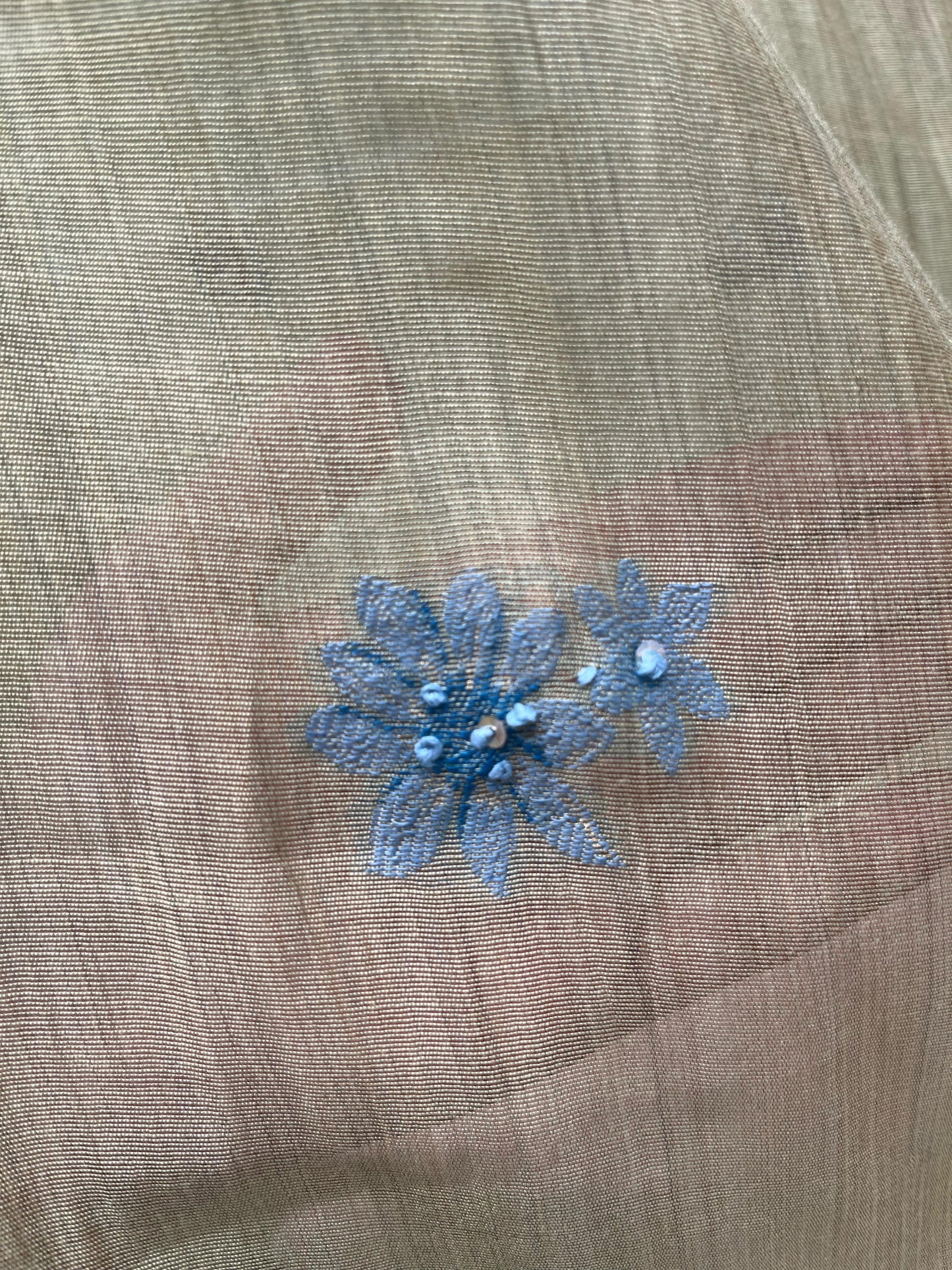 Olive green unstitched suit fabric with delicate blue floral embroidery