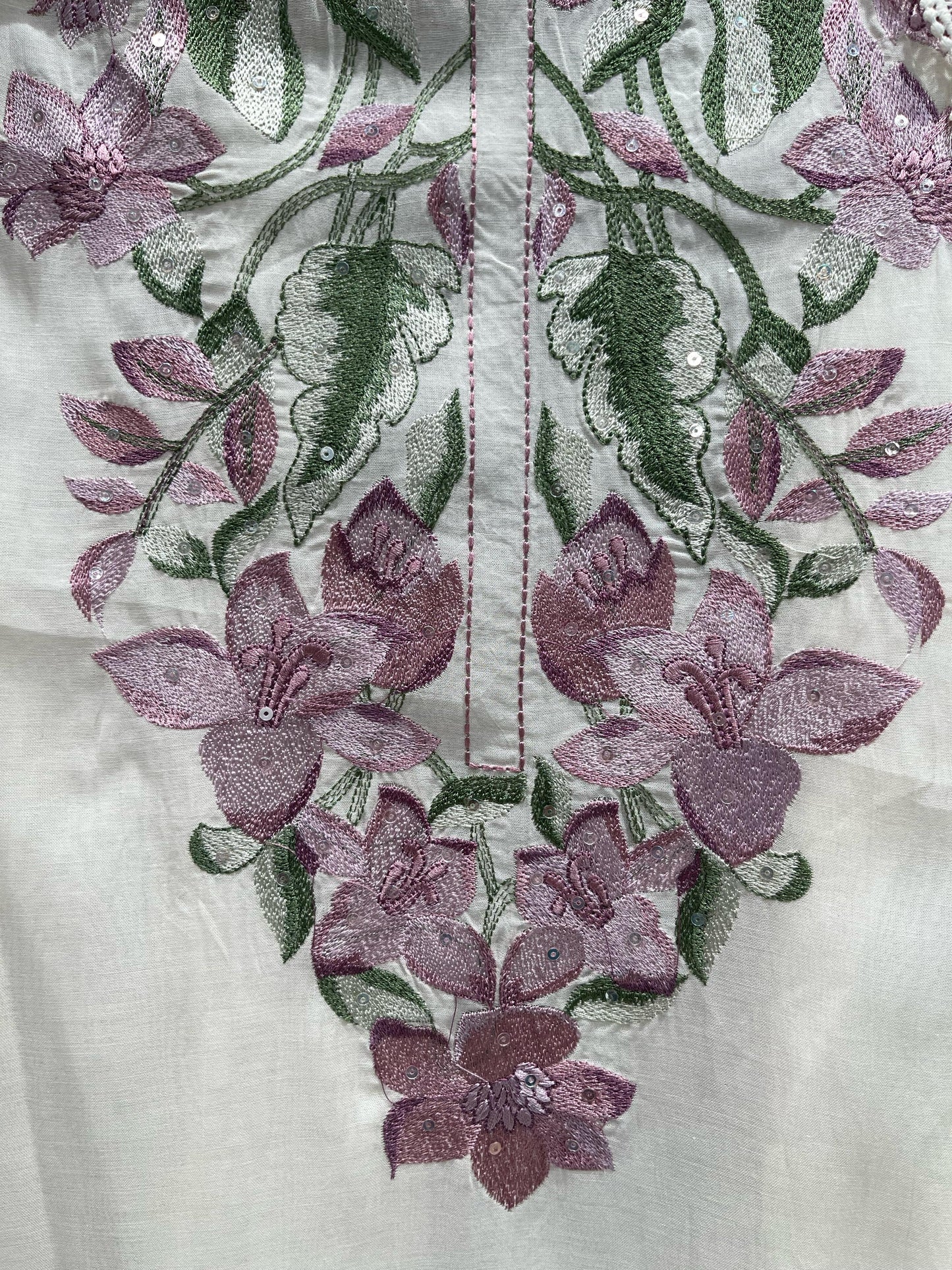 Enhance your ethnic wardrobe with this beautifully designed