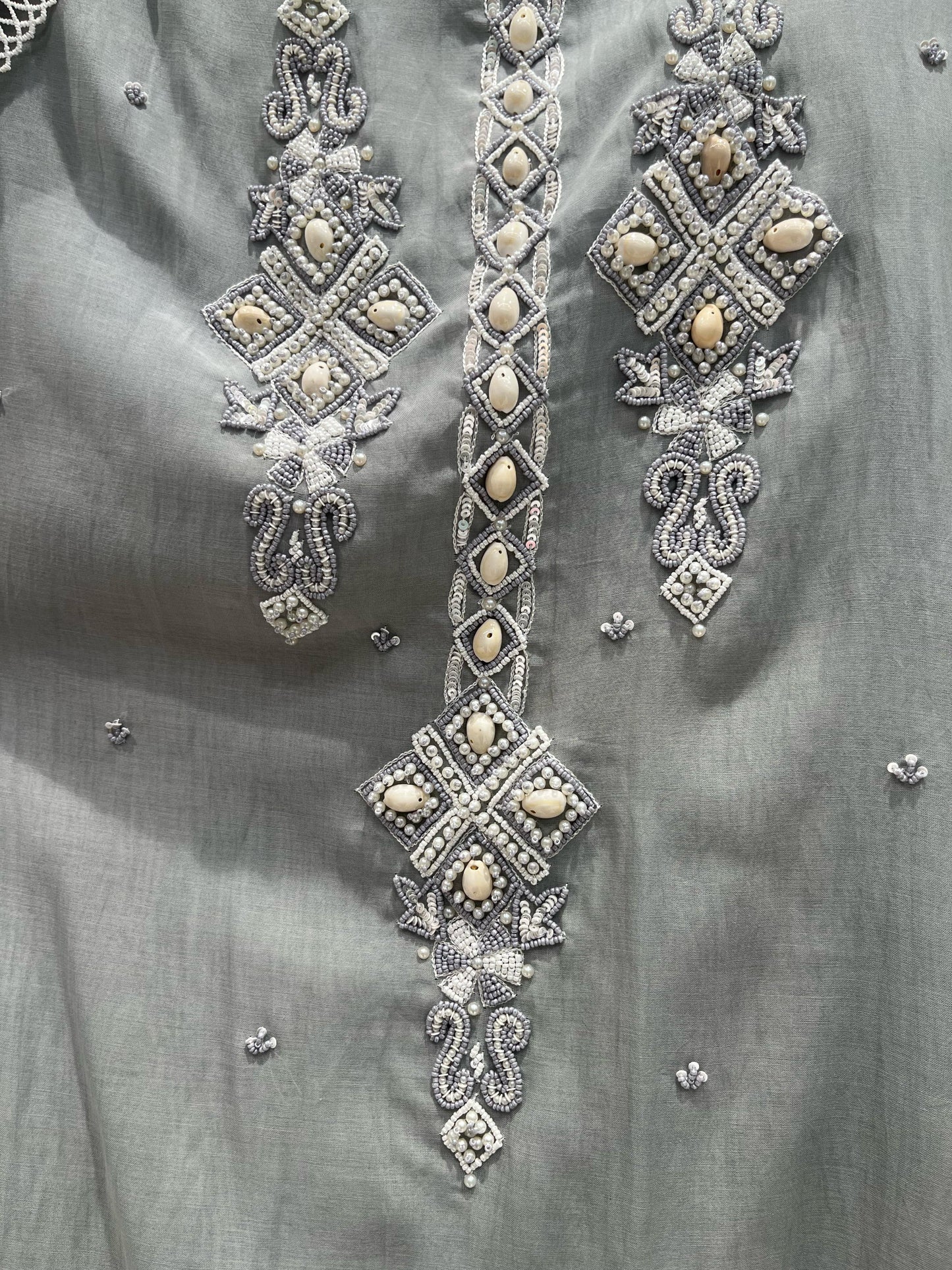 Experience timeless elegance with this beautifully designed unstitched suit