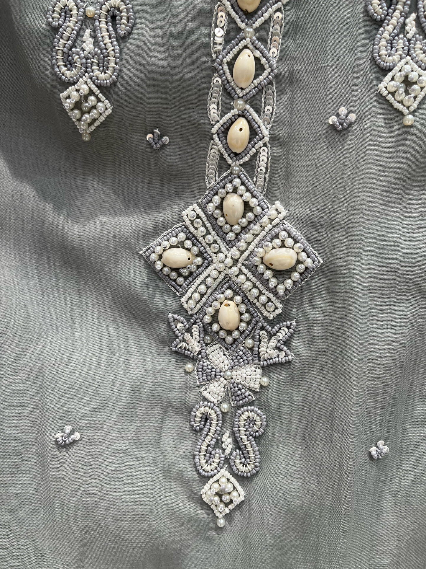 Experience timeless elegance with this beautifully designed unstitched suit