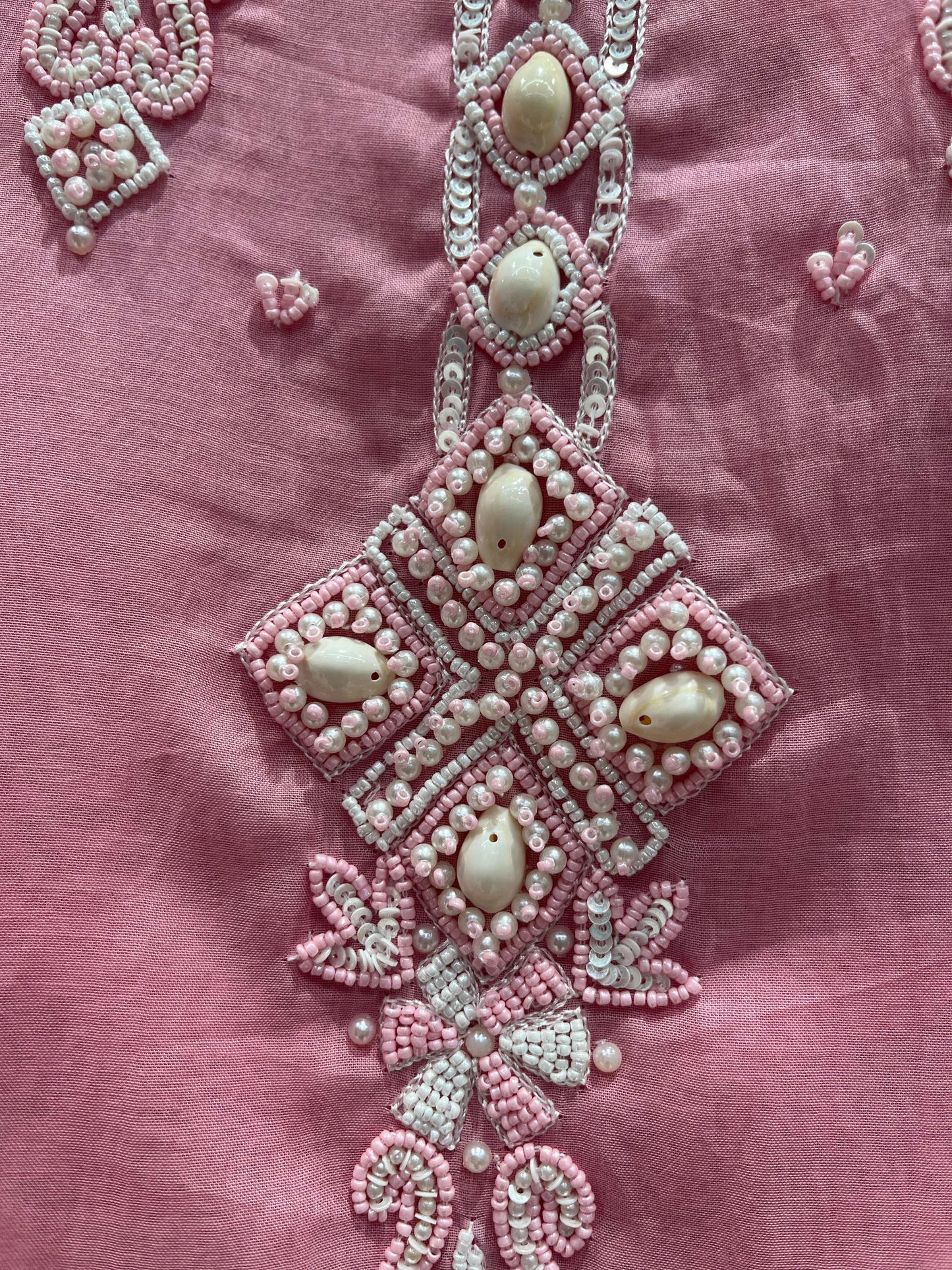 Experience timeless elegance with this beautifully designed unstitched suit