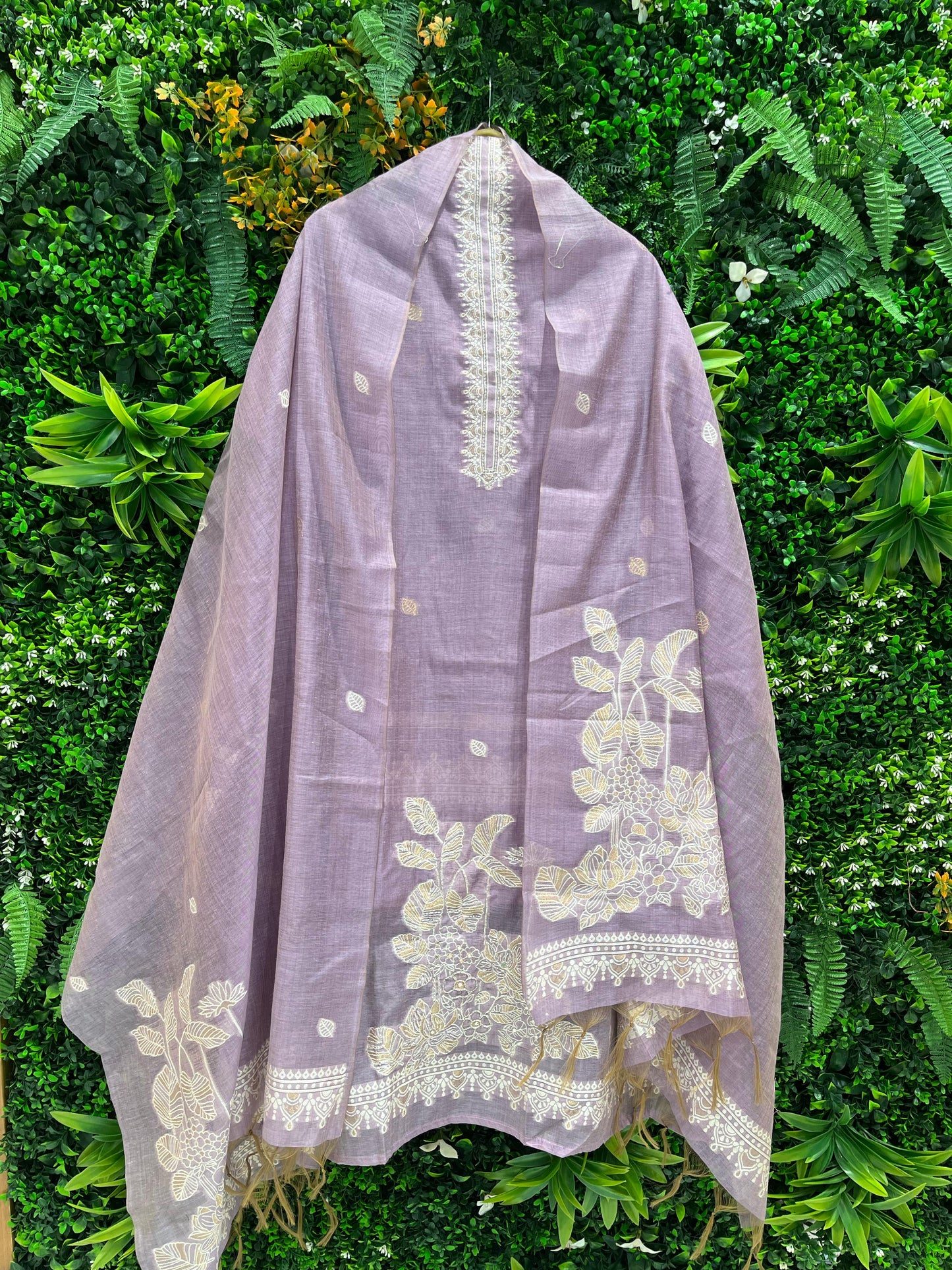 Elevate your ethnic wardrobe with this elegant unstitched suit set