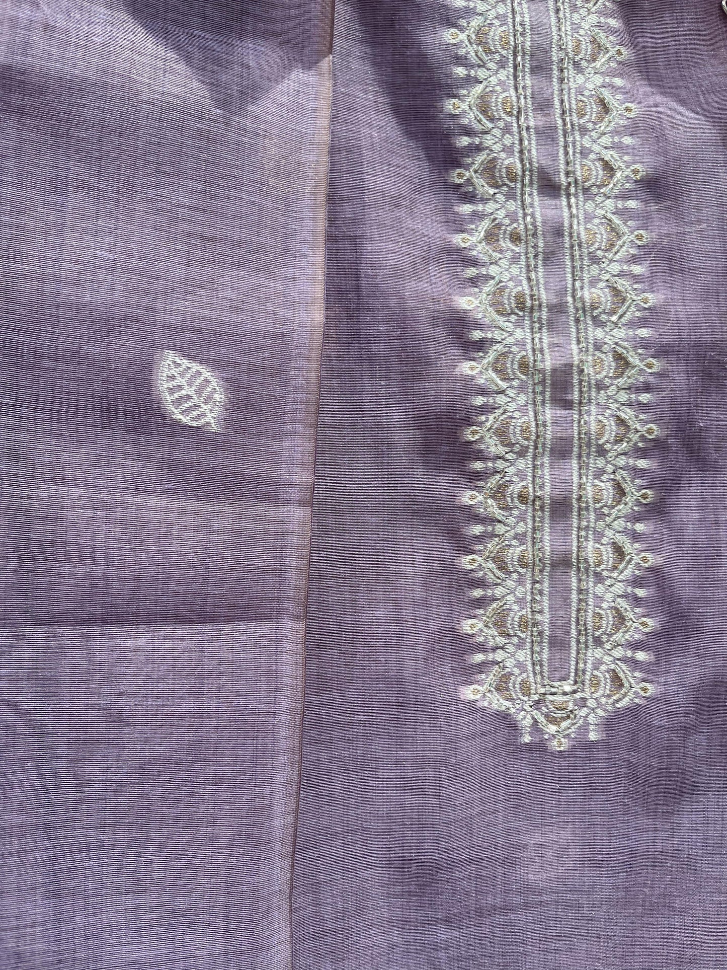 Elevate your ethnic wardrobe with this elegant unstitched suit set