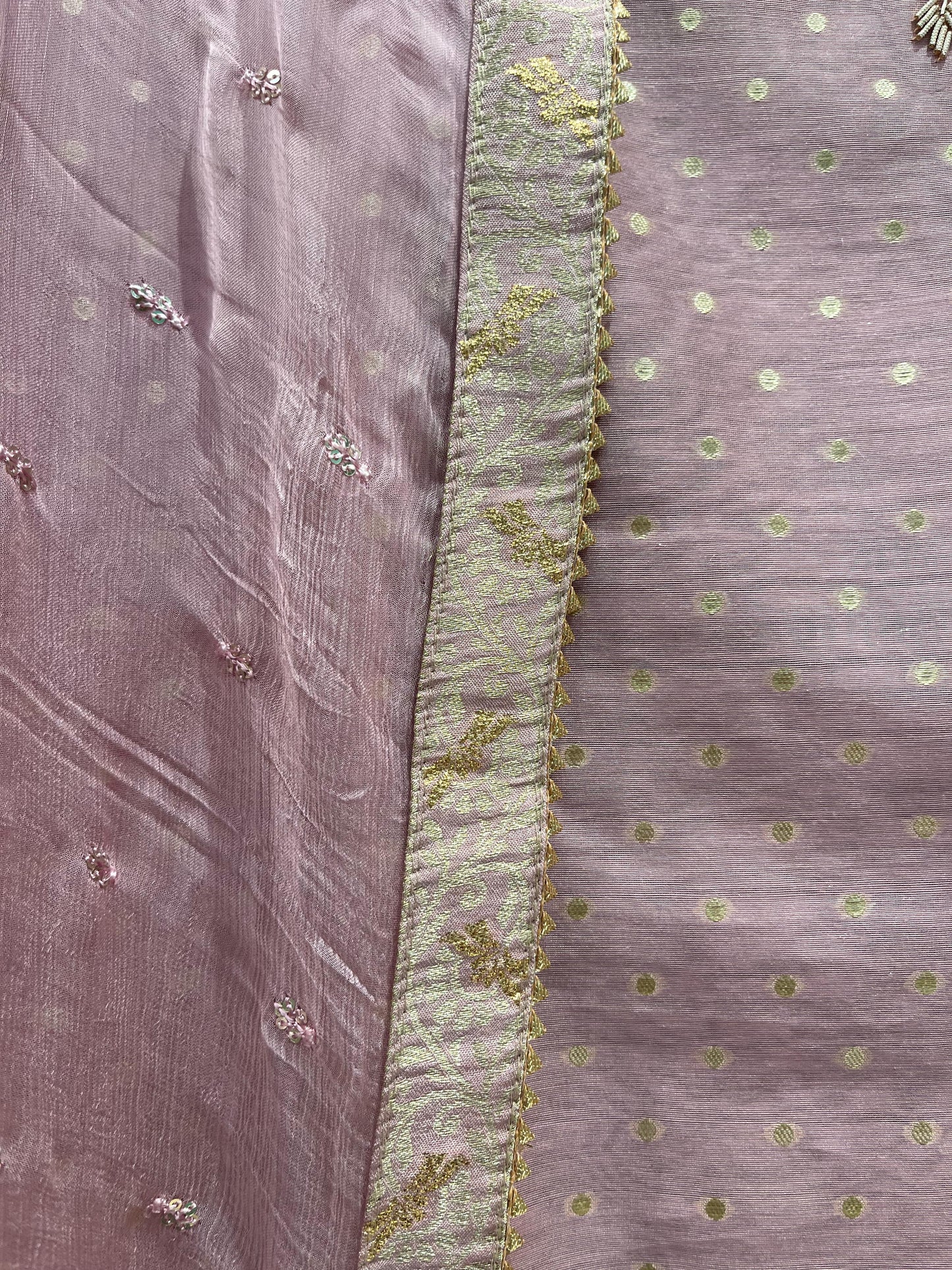 Banarasi silk fabric embellished with intricate handwork