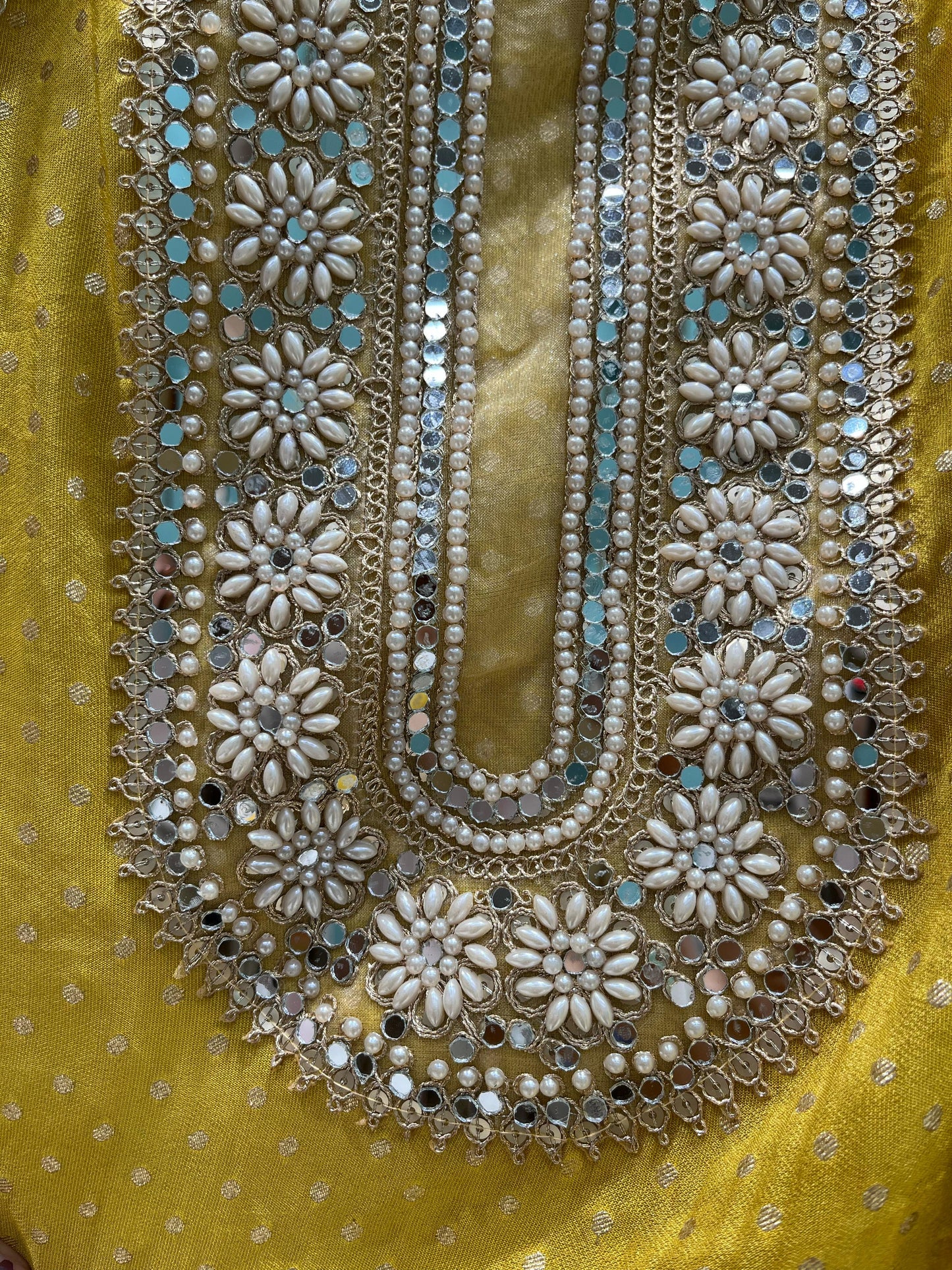 Step into timeless grace with this exquisite unstitched suit set