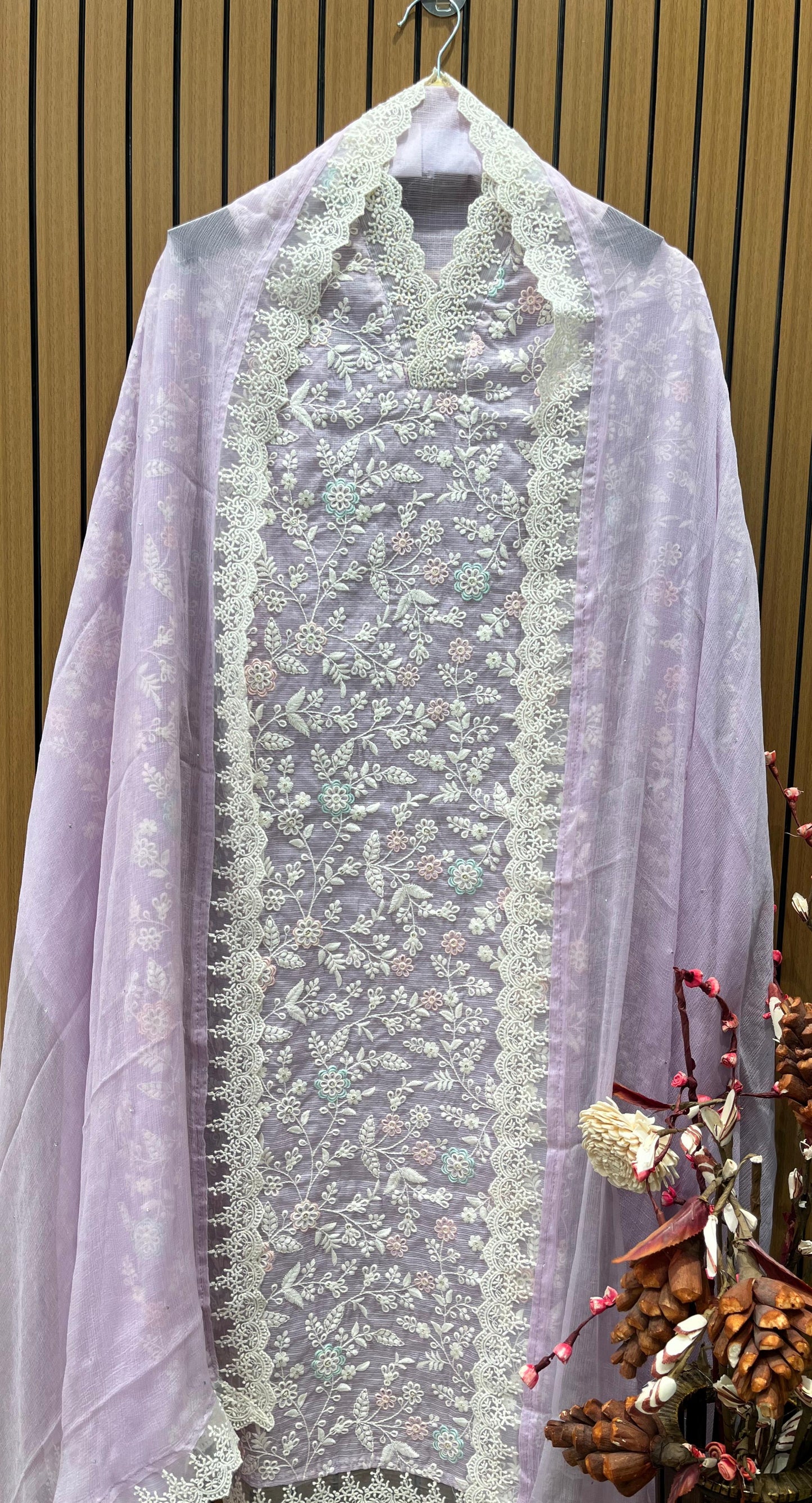 Step into timeless style with this unstitched Kota Doriya suit set