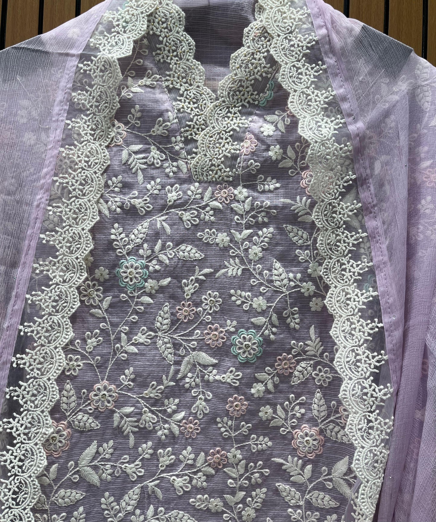 Step into timeless style with this unstitched Kota Doriya suit set