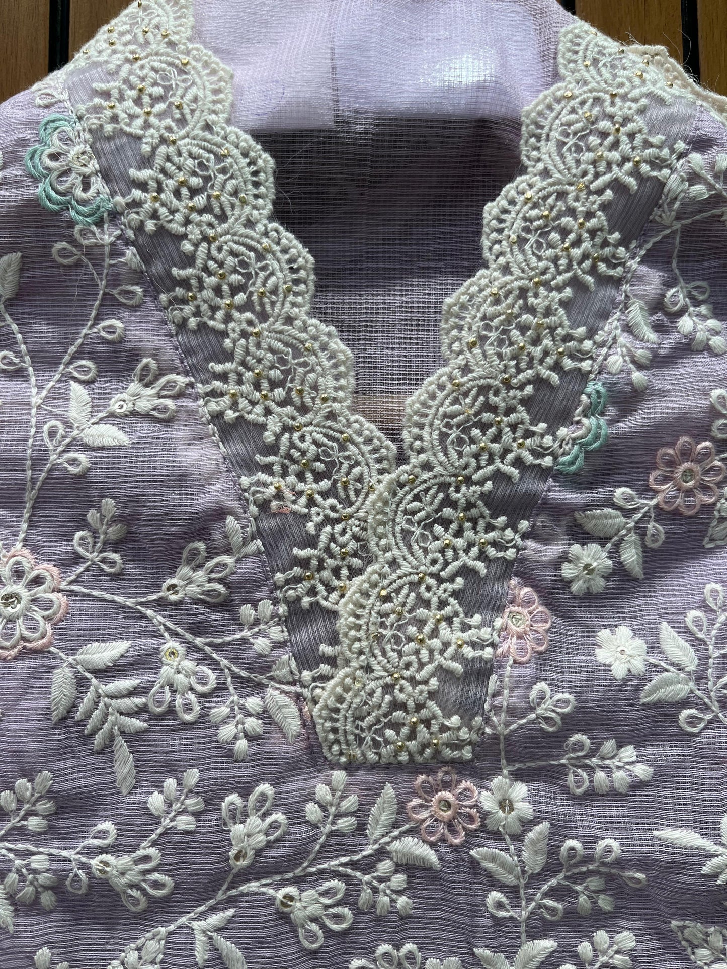 Step into timeless style with this unstitched Kota Doriya suit set