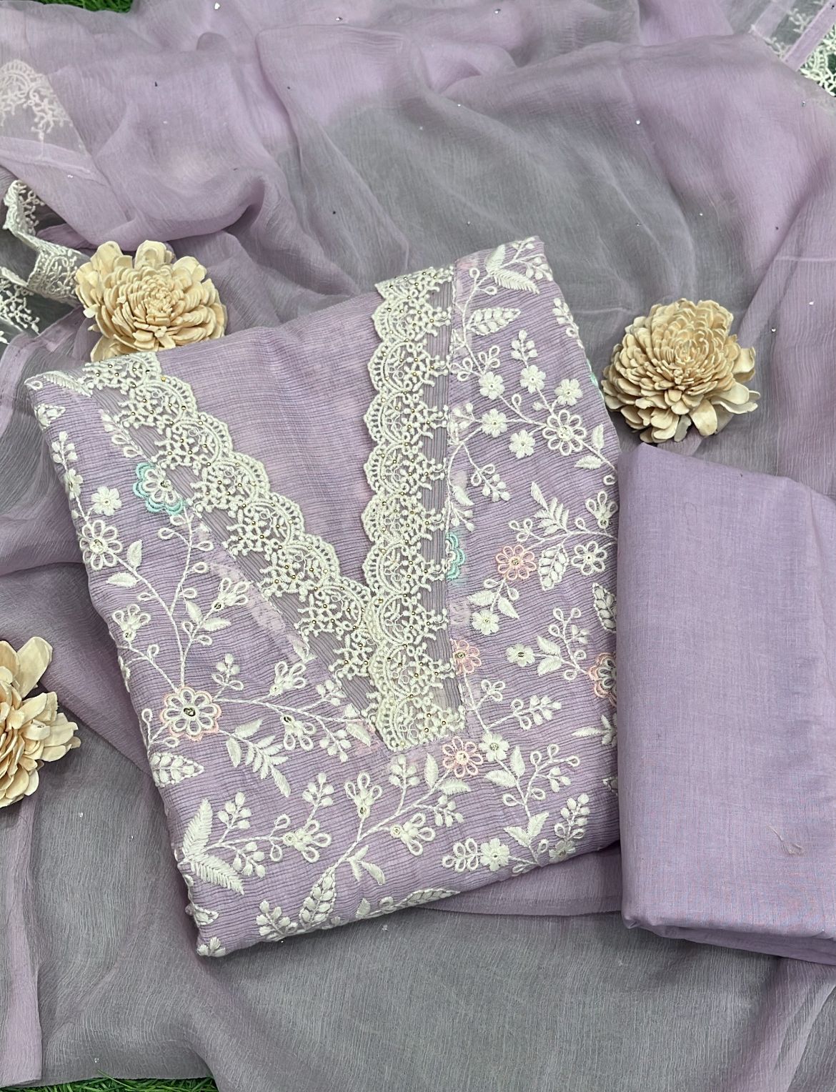 Step into timeless style with this unstitched Kota Doriya suit set