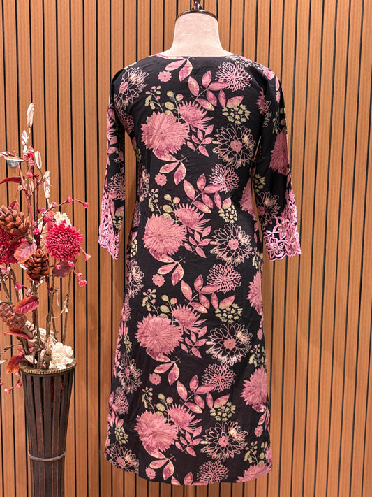 This elegant floral-printed suit features a deep brown base