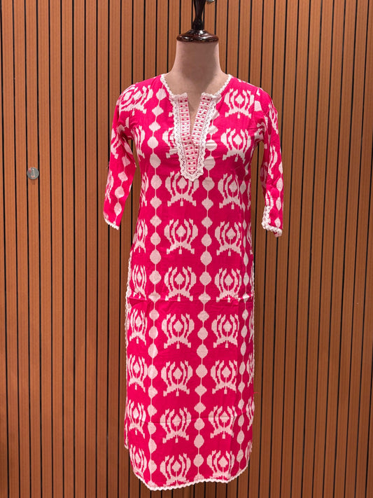 Vibrant pink and white ethnic suit set features a bold printed kurta