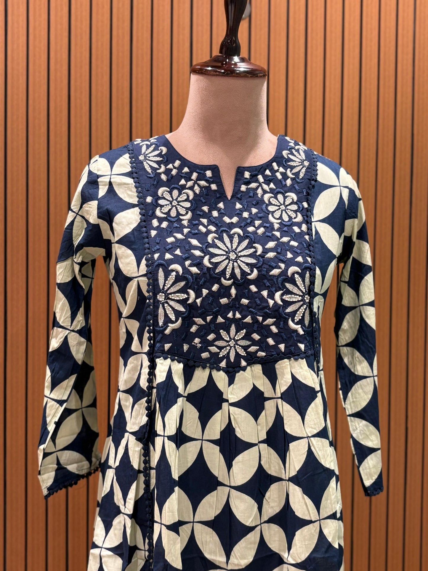 Elegant navy blue and cream suit set is a statement in timeless prints