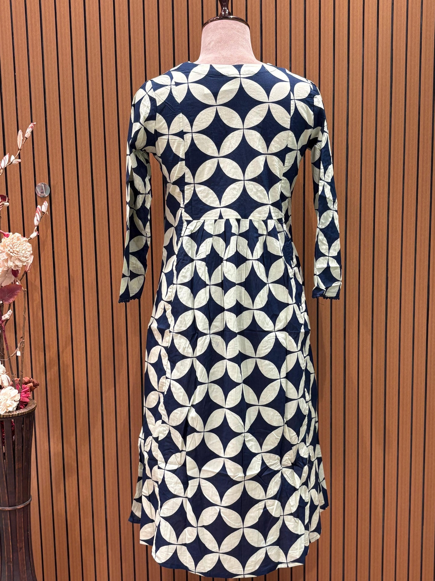 Elegant navy blue and cream suit set is a statement in timeless prints