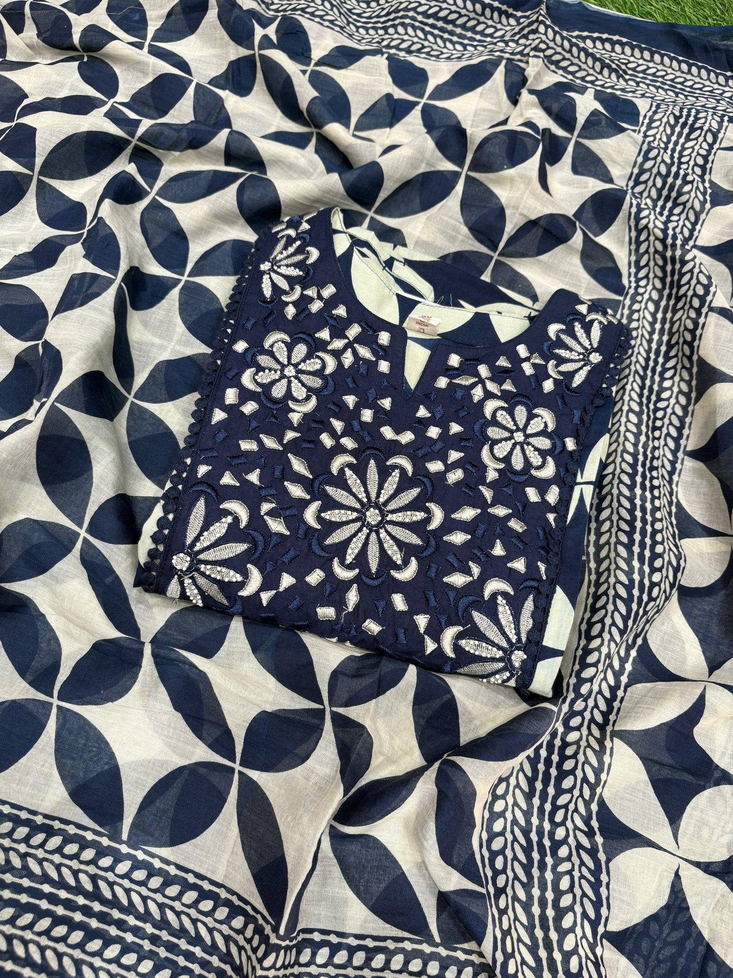 Elegant navy blue and cream suit set is a statement in timeless prints