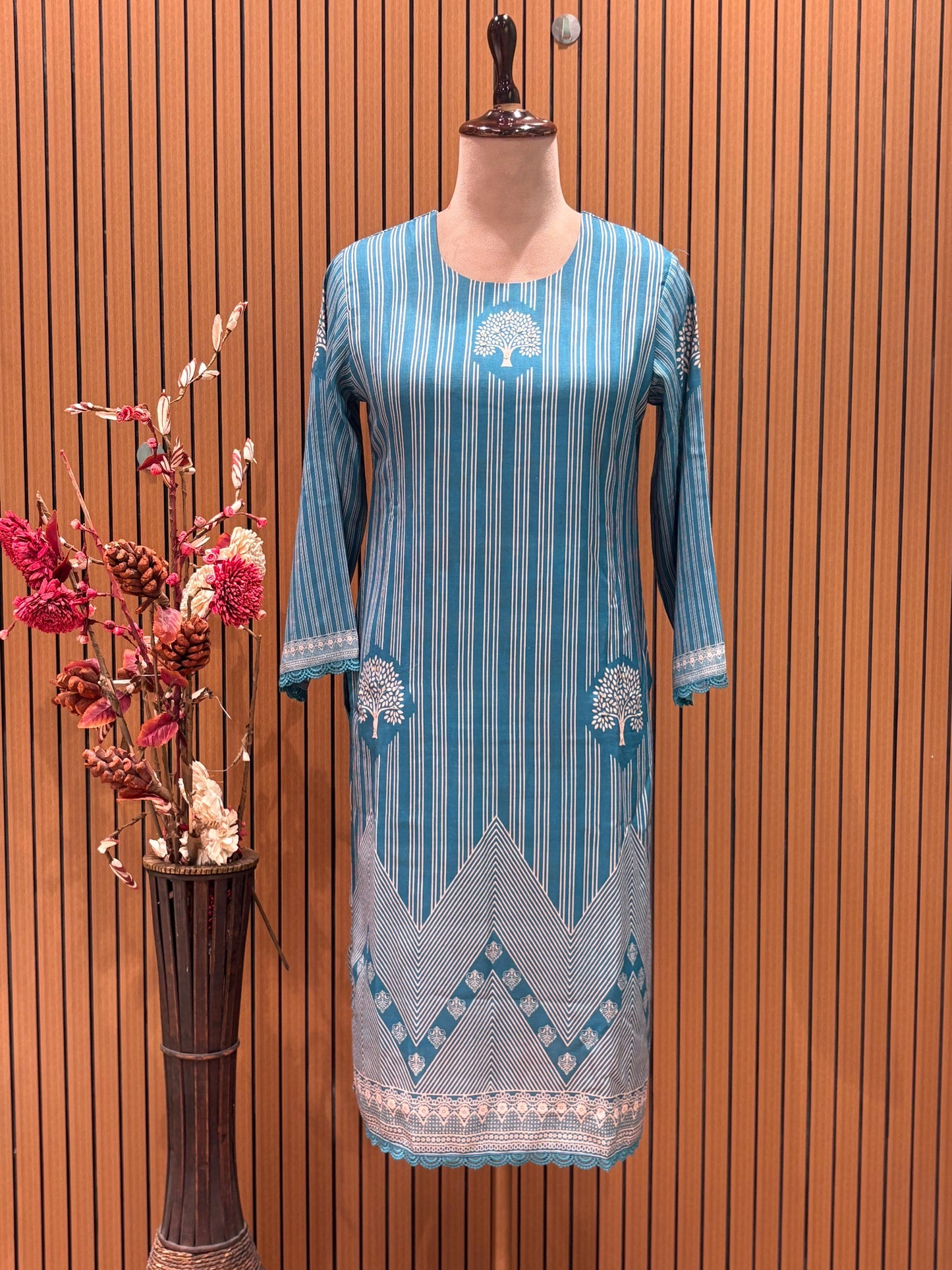 Soft teal suit set is all about understated elegance