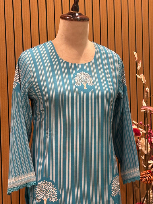 Soft teal suit set is all about understated elegance