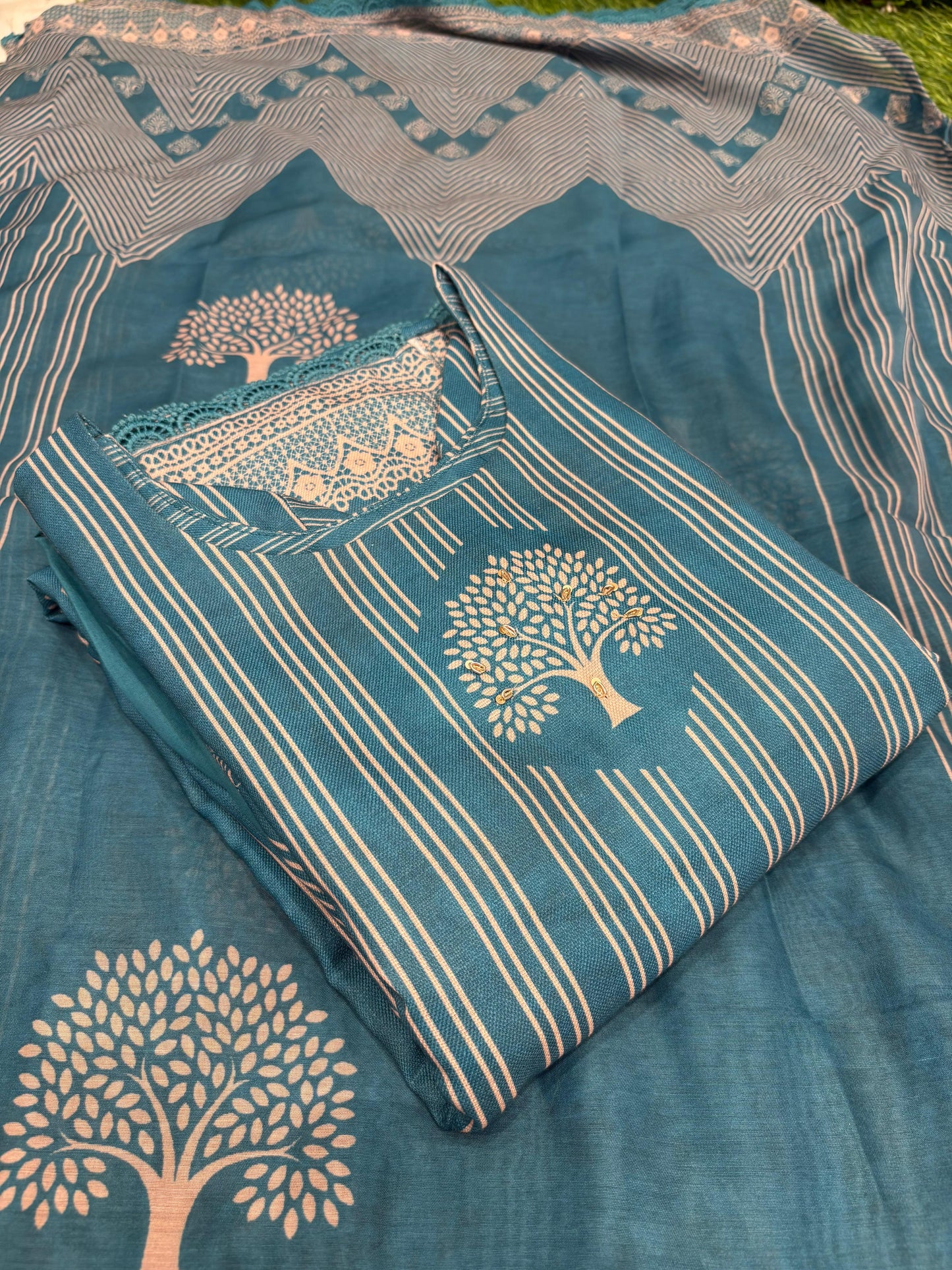 Soft teal suit set is all about understated elegance