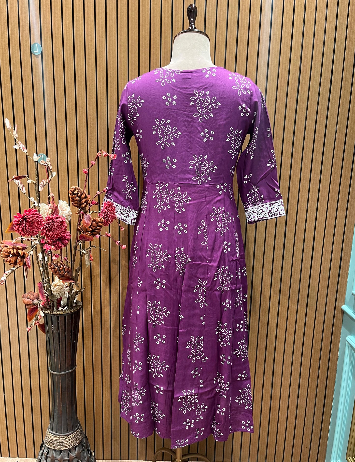 Vibrant purple ethnic set showcases intricate white thread embroidery