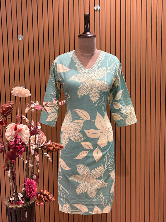 Stay effortlessly stylish with this floral-printed cotton suit