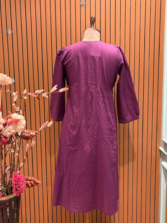 Playful charm to your look with this deep plum