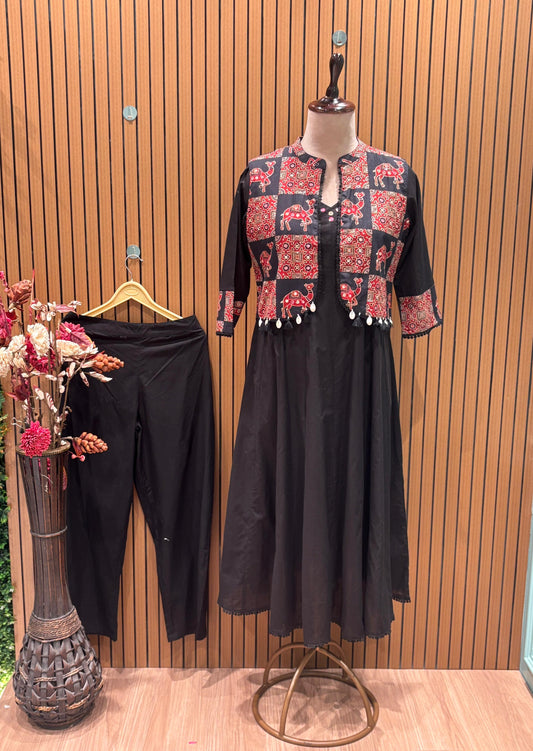 Turn heads in this black flared kurta set with a vibrant printed jacket