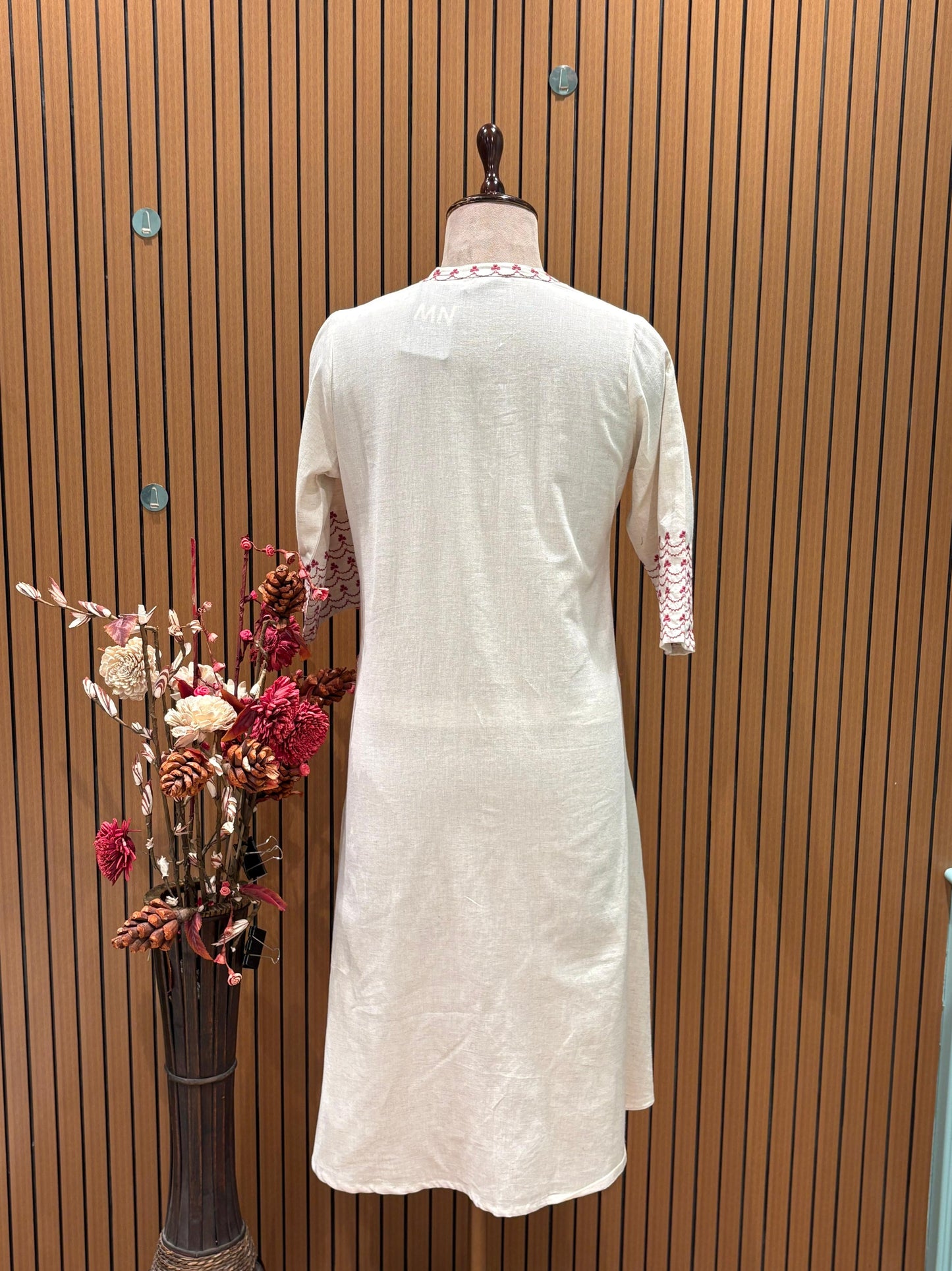 Stylish, and breathable in our off-white cotton kurta