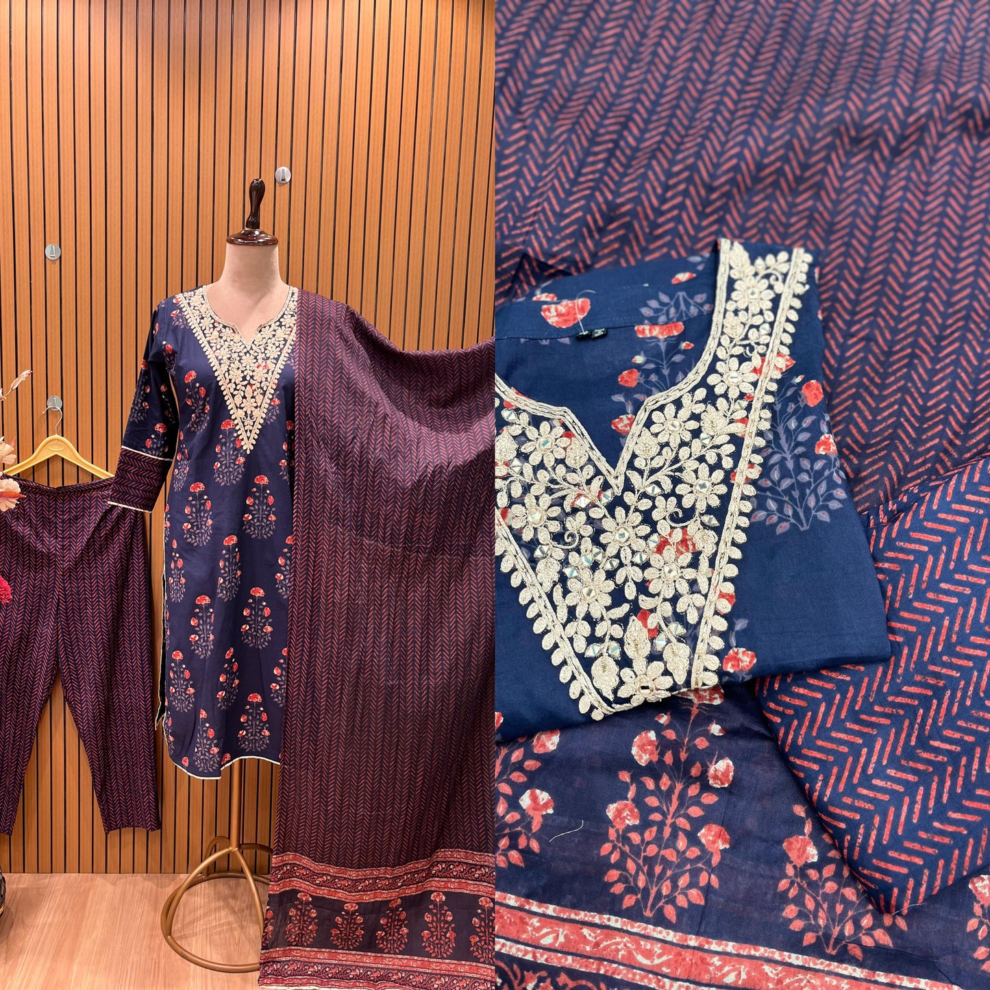 Elegant navy blue three-piece suit features floral embroidery on the neckline,