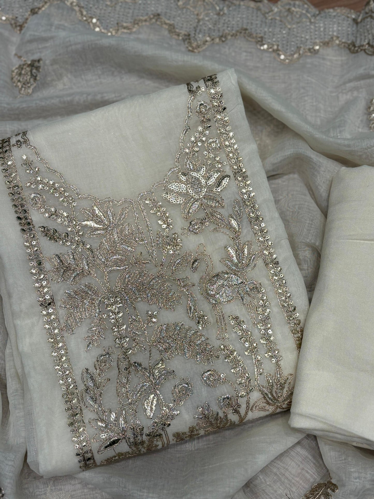 Elevate your ethnic style with our unstitched suit fabric crafted from premium mul Chanderi
