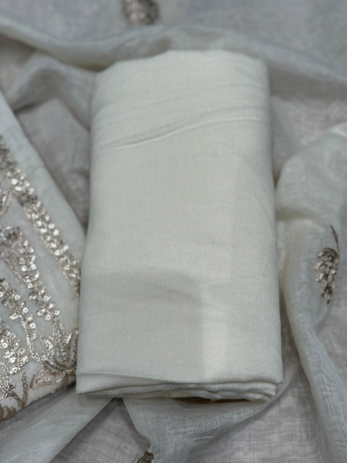 Elevate your ethnic style with our unstitched suit fabric crafted from premium mul Chanderi