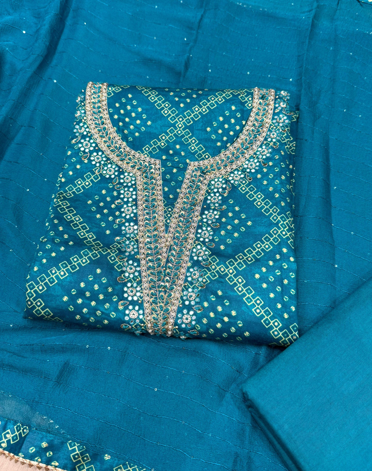 Discover timeless elegance with our unstitched suit fabric