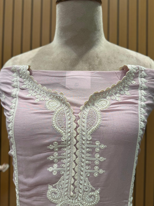 Embrace effortless elegance with our unstitched suit set