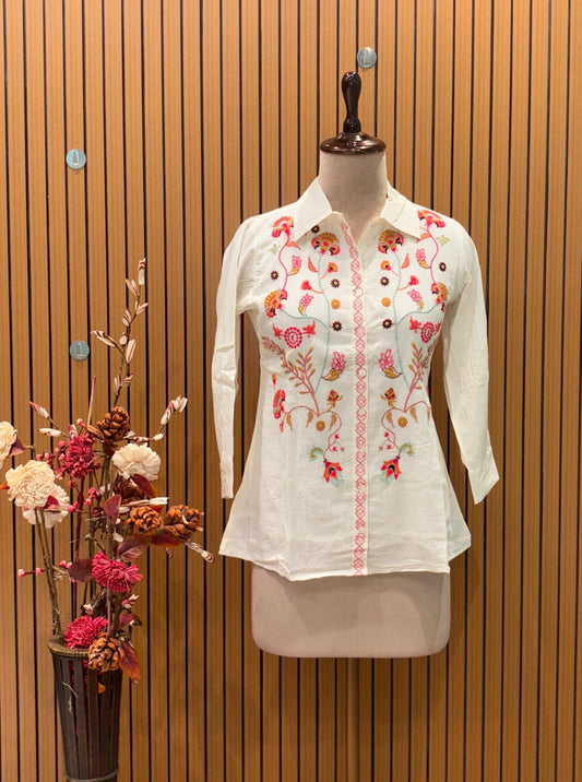 Trendy ethnic co-ord set features a cream-colored cotton fabric