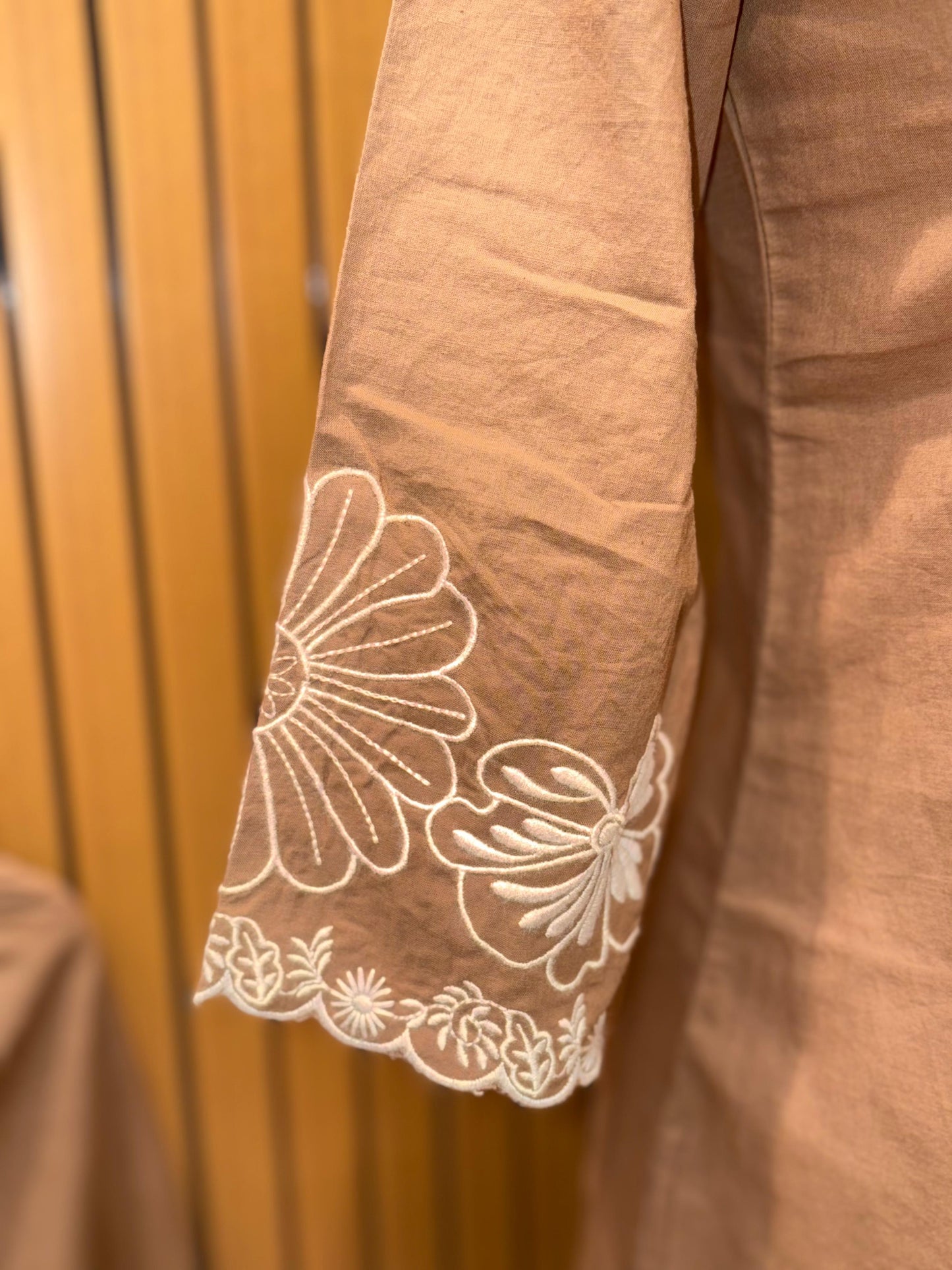 Stylish brown cotton co-ord set showcases elegant white floral