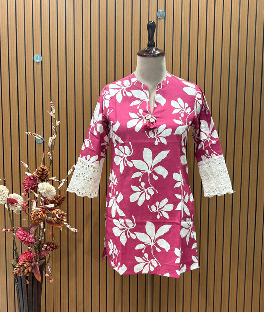 Vibrant magenta co-ord set features bold white floral prints