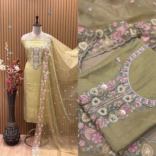 Elevate your ethnic wardrobe with this exquisite unstitched suit