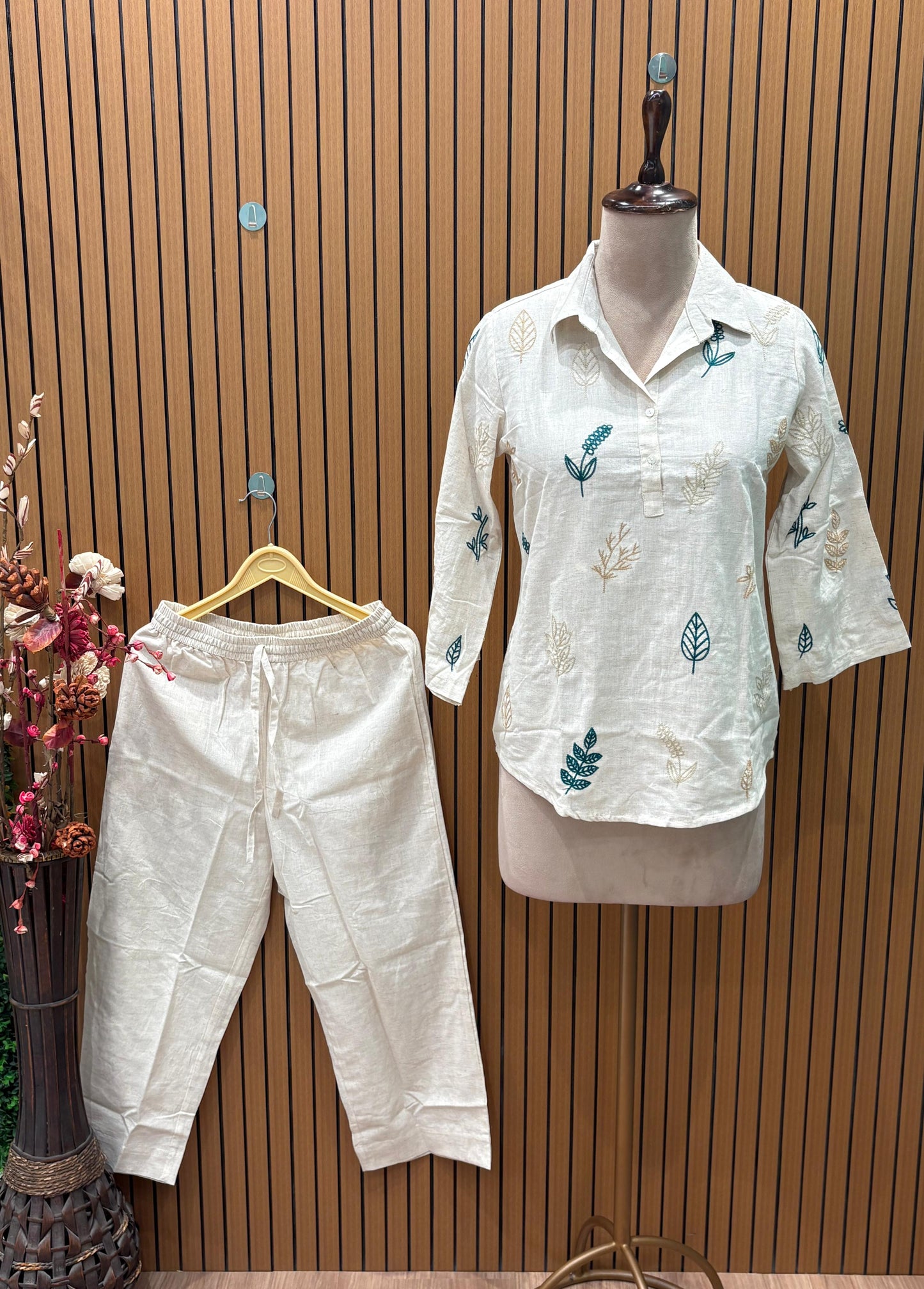 Elegant co-ord set in off-white cotton-linen blend featuring leaf