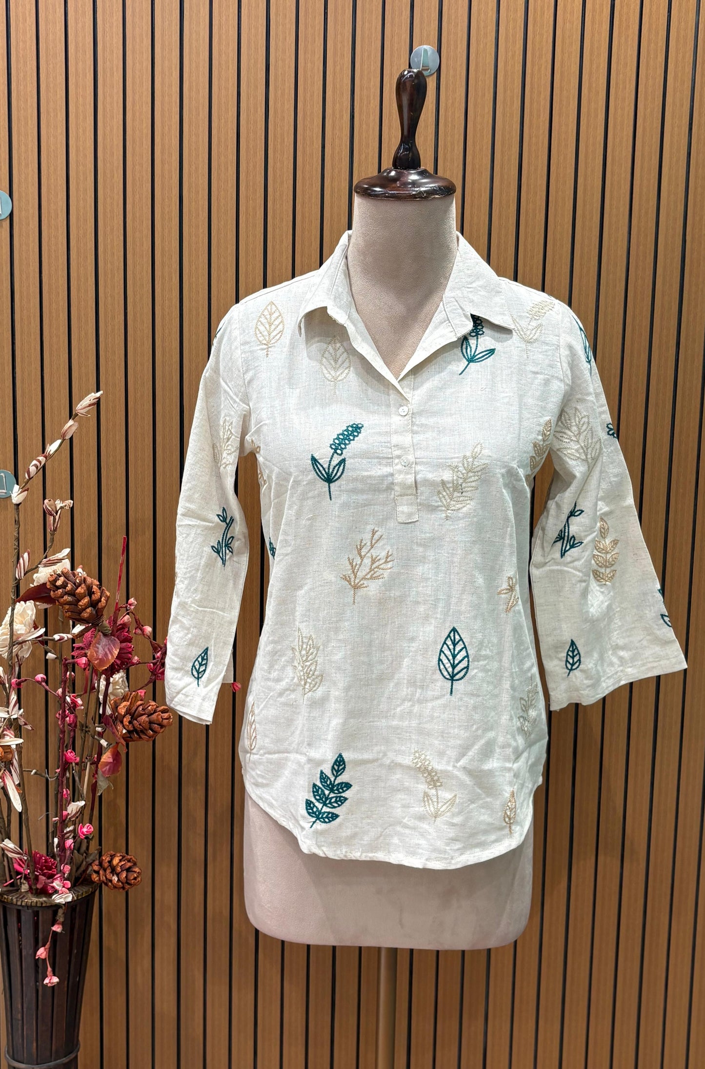 Elegant co-ord set in off-white cotton-linen blend featuring leaf