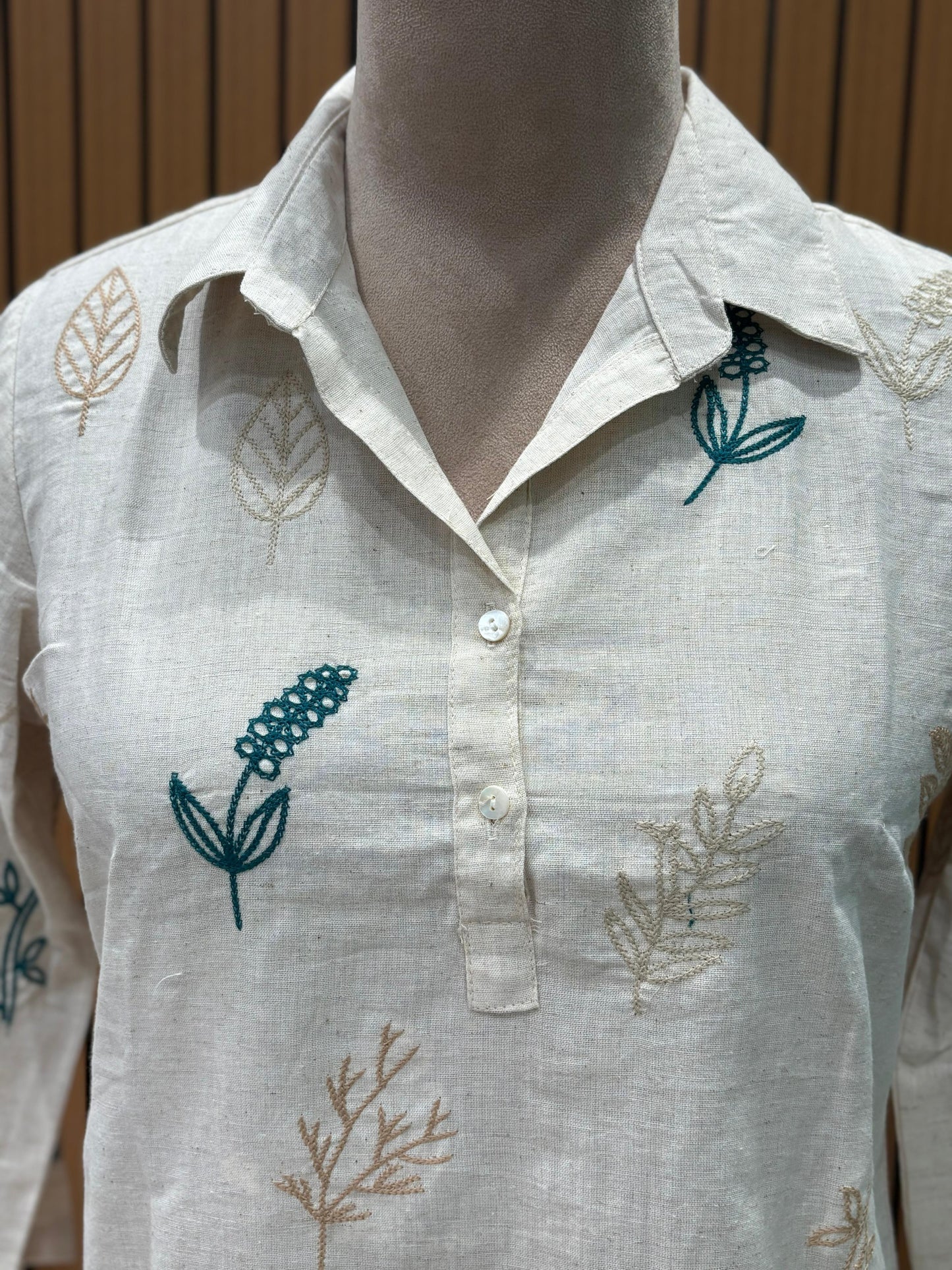 Elegant co-ord set in off-white cotton-linen blend featuring leaf