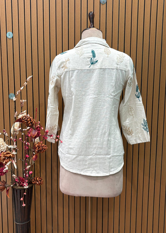 Elegant co-ord set in off-white cotton-linen blend featuring leaf