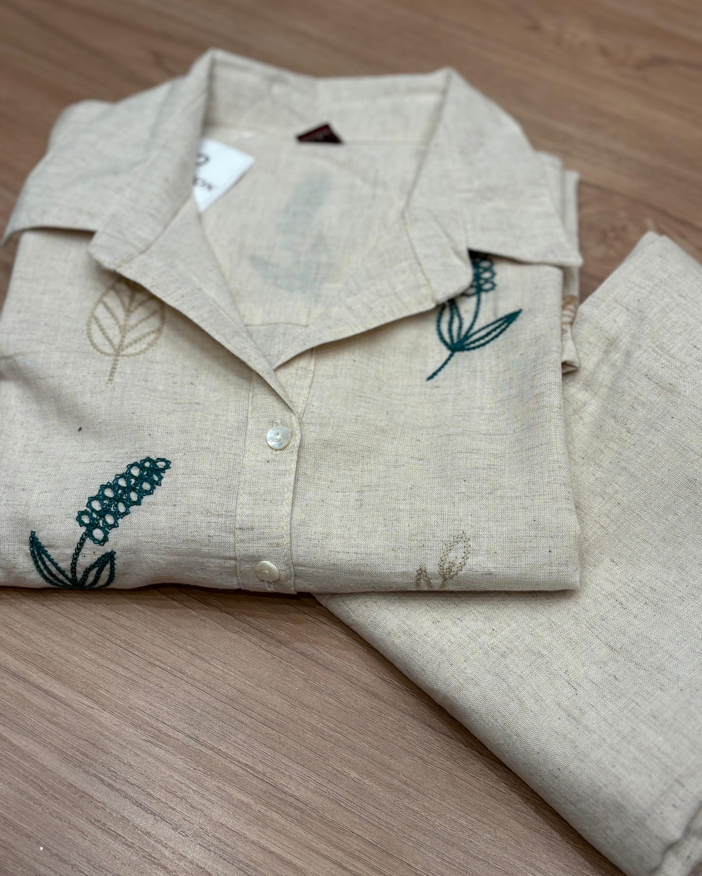 Elegant co-ord set in off-white cotton-linen blend featuring leaf