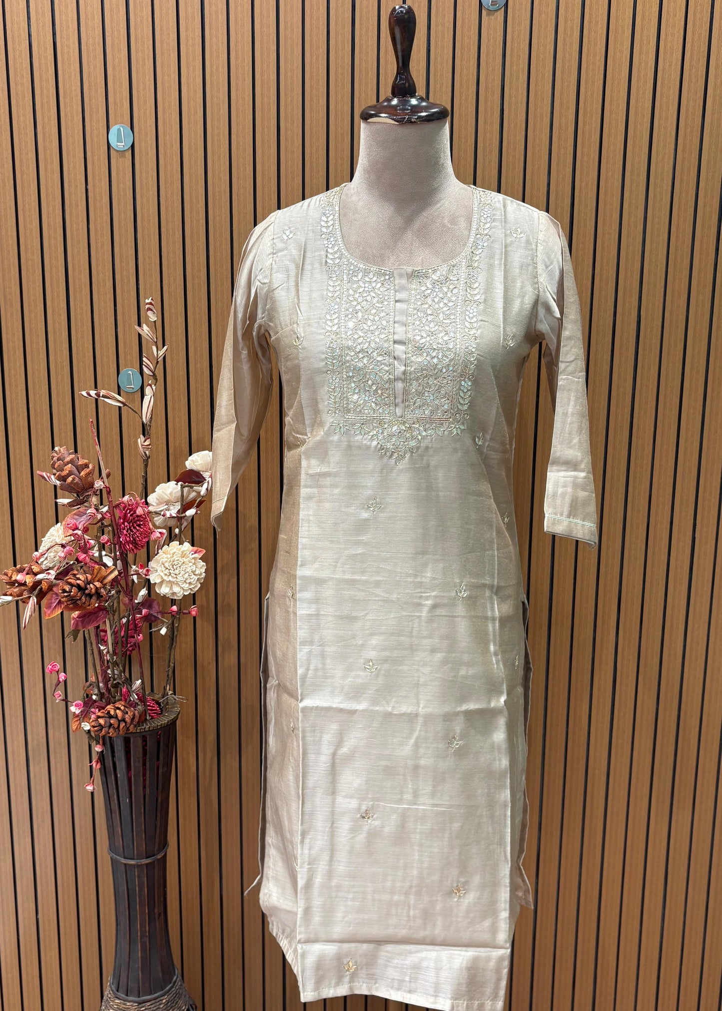 Graceful mul chanderi suit set featuring intricate mirror