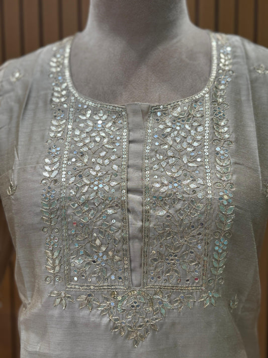 Graceful mul chanderi suit set featuring intricate mirror