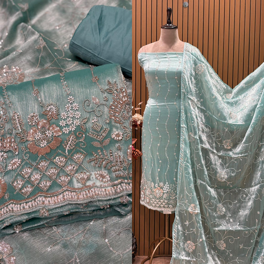 Make a bold fashion statement with our premium unstitched suit