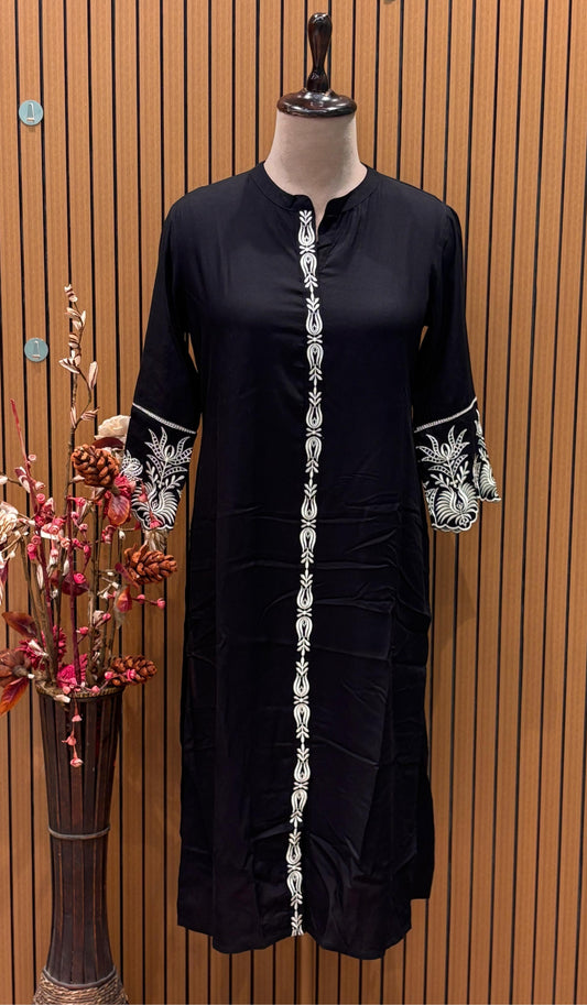 Make a powerful statement with this classic black kurta set