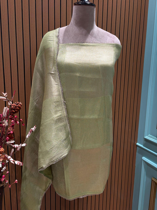 Step into timeless elegance with this luxurious unstitched suit