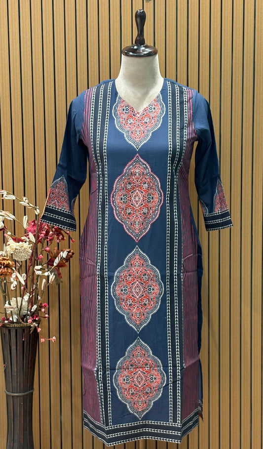 Radiate festive charm in this vibrant orange cotton suit